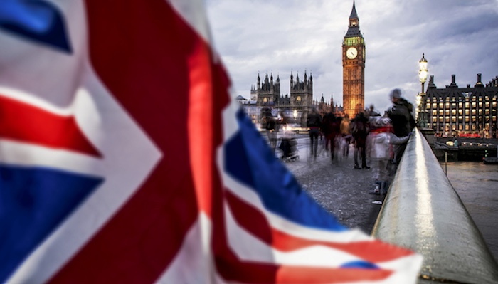 brexit concept - double exposure of flag and Westminster Palace with Big Ben