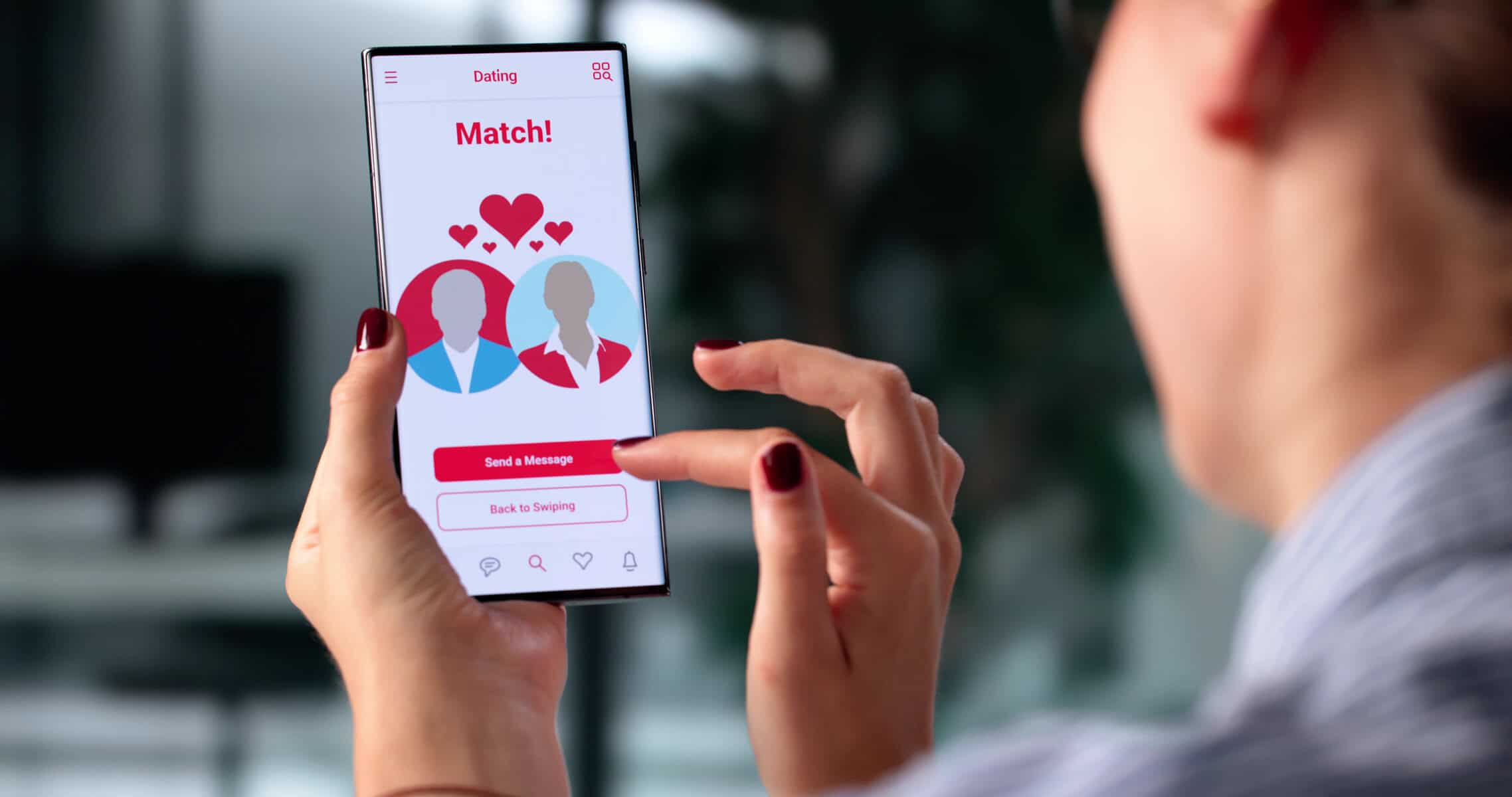 Woman Using Online Dating App On Smartphone Possibly Falling For Scam