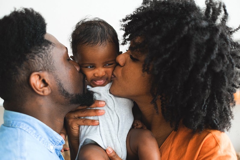 202511African-couple-with-their-baby