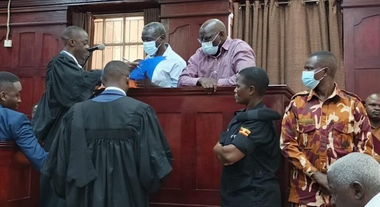 202607State-prosecutor-Assistant-DPP-Thomas-Jatiko-together-with-Chief-State-Attorney-Richard-Birivumbuka-serve-evidence-to-Besigye