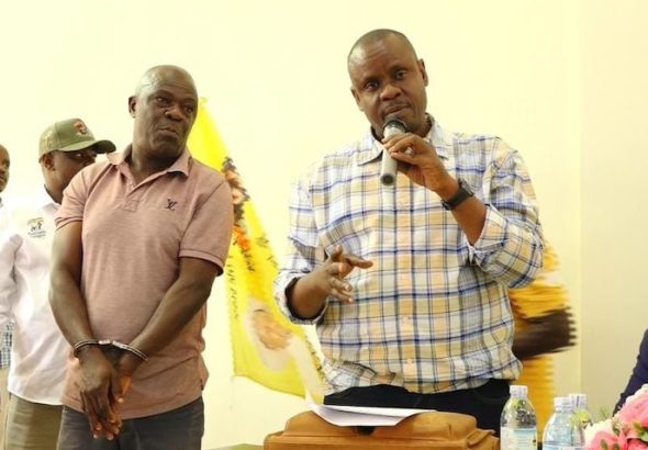 202608Minister-of-Local-Government-Balaam-Baruhagara-with-ambulance-driver-Godfrey-Mugumya