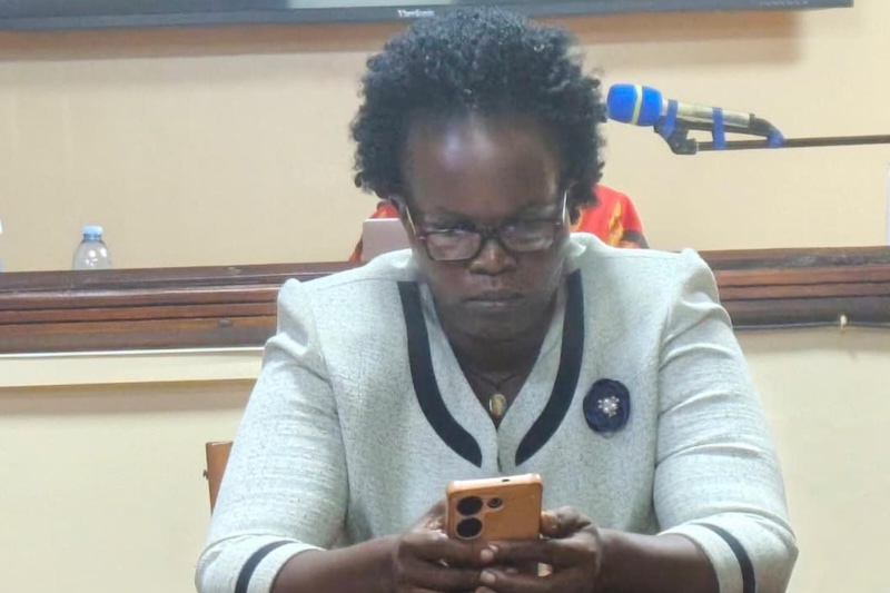 202608Susan-Vivian-Ariokot-checking-footage-on-her-phone